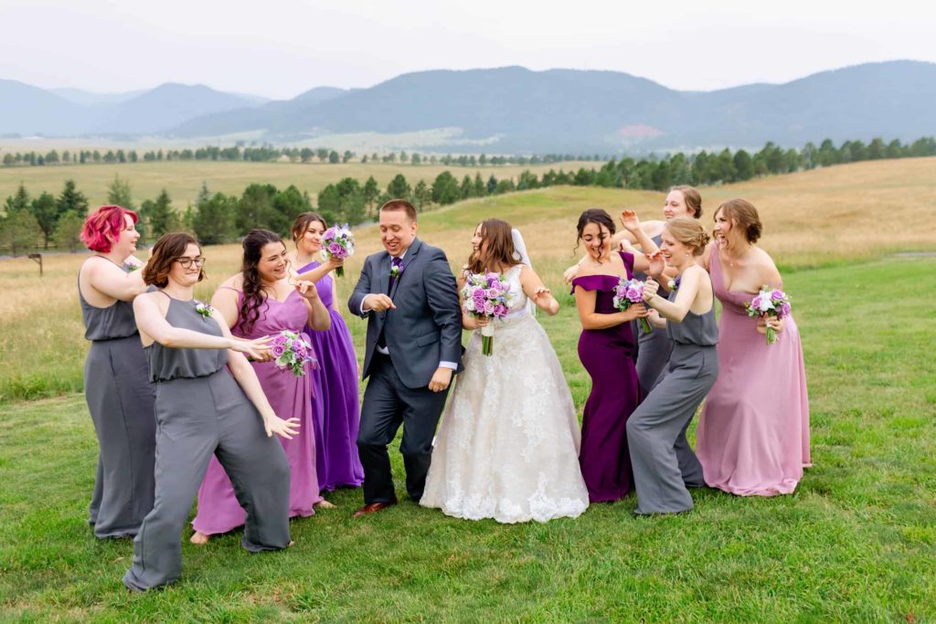 Wedding party dancing in the mountains