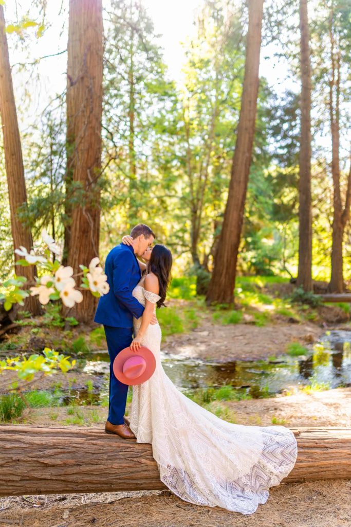 Bride and Groom kissing in yosemite valley